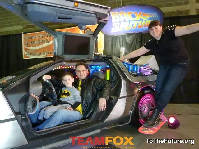 In this image I can see a man, a boy and a woman where man and boy is in car. I can also see smile...