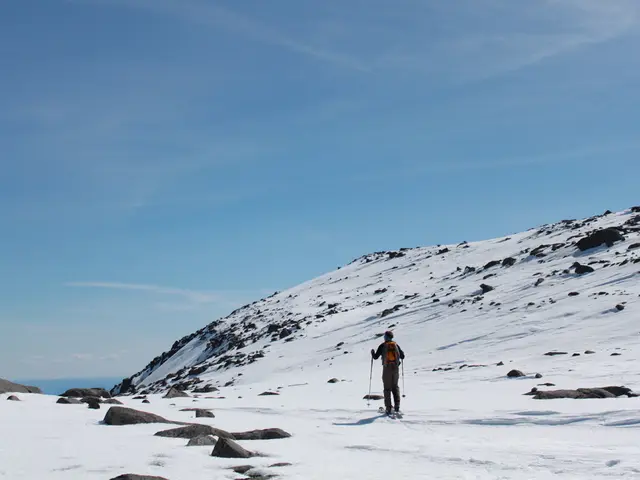 This is the picture of a place where we have a person who is holding the sticks and skating on the...