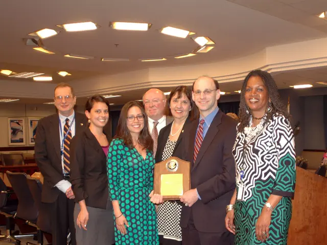 In this picture there are group of people those who are standing in the center of the image, by...