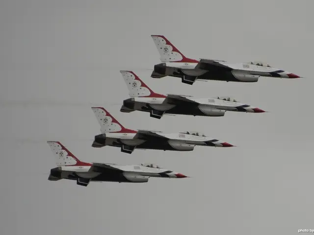 In this image, there are four jet planes flying in the sky. At the bottom right corner of the...