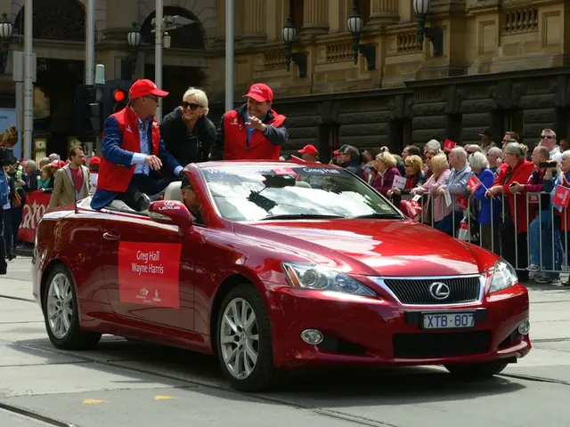 In this image, we can see people are riding a car on the road. In the background, there are...