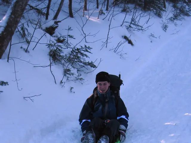 This picture is taken from the outside of the city. In this image, we can see a man sitting on the...