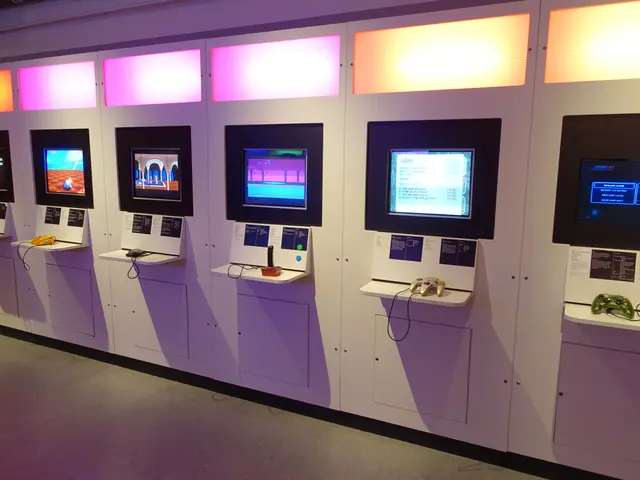 The image shows a room filled with lots of different types of video game consoles, each with a...