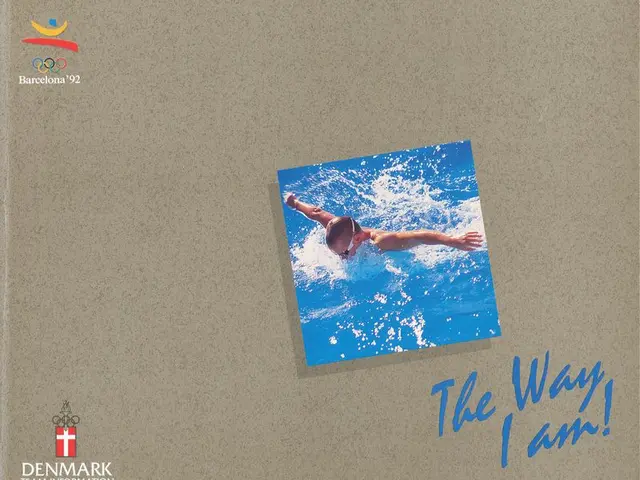 The image shows a book with a picture of a person swimming in the water and the words "The Way I...