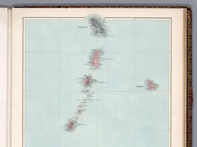 The image shows an open book with a map of the windward islands on it. The map is detailed and...