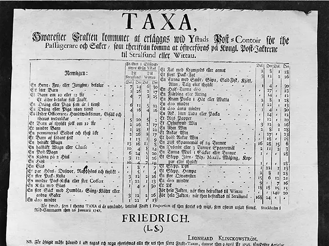 The image shows a black and white photo of a tax form with text and numbers on it.
