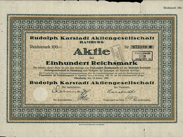 The image shows an old German banknote with a black background. The paper has text written on it,...
