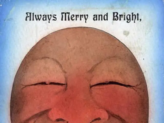 The image shows a poster with a picture of a person's face and the text "Always Merry and Bright"...