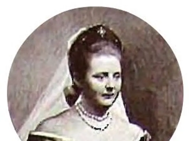 The image shows a black and white photo of a woman in a wedding dress, adorned with pearls. She has...