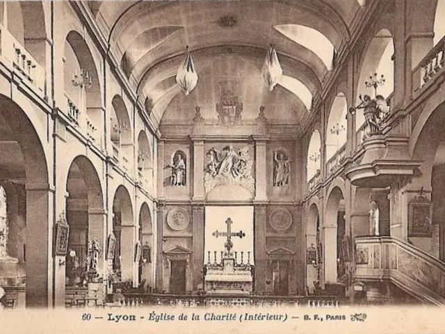 The image shows an old black and white photo of the interior of a church in Lyon, France. It...