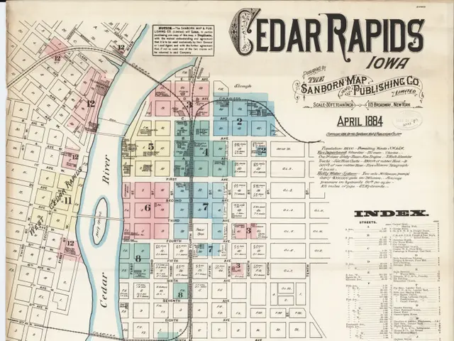 The image shows an old map of Cedar Rapids, Iowa from 1884. It is a detailed map with text written...