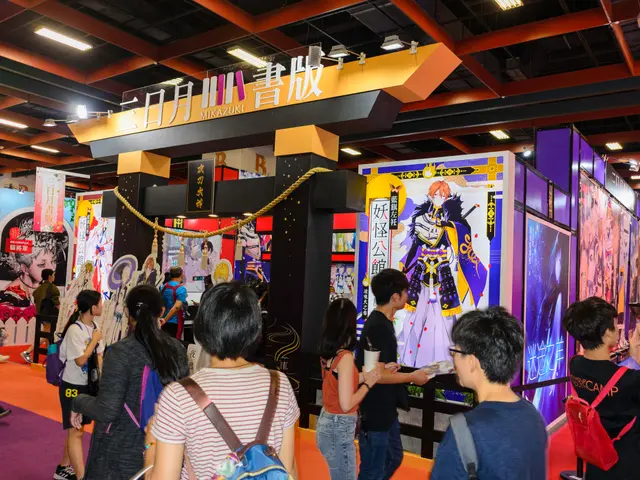 The image shows a group of people standing in front of a booth at a convention, with some of them...