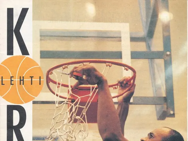 The image shows a man dunking a basketball into the hoop with a basketball net in the background....