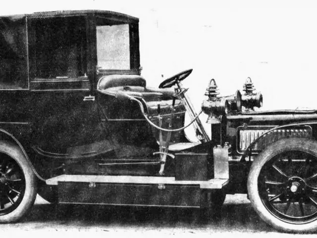 The image shows an old black and white photo of an old car, which is believed to be one of the most...