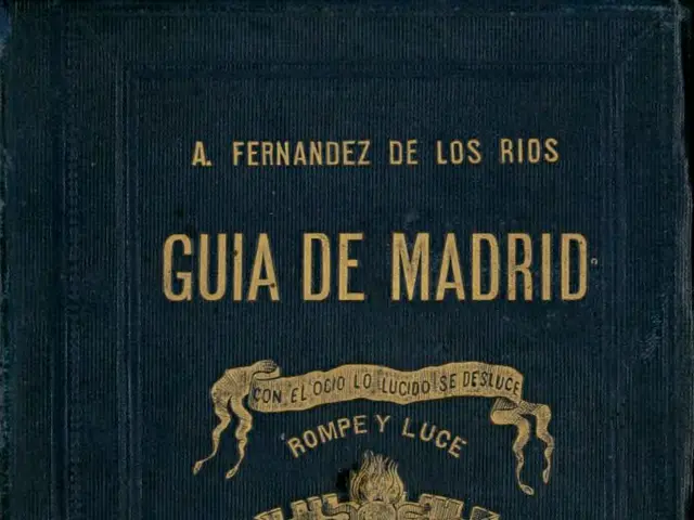 The image shows a book titled "Guia de Madrid" by A. Fernando de Los Rios, with text and an image...