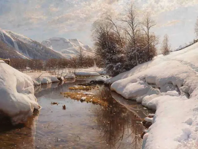 The image shows a winter landscape with a river winding through a snowy mountain range, surrounded...