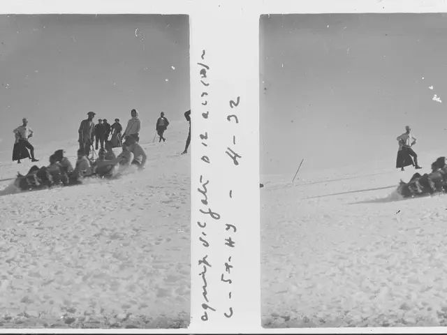 The image shows a group of people riding on top of a snow-covered field, with the sky in the...