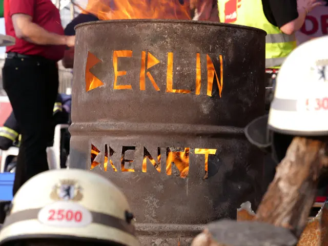 The image shows a group of people standing around a fire hydrant with the word "Berlin" written on...