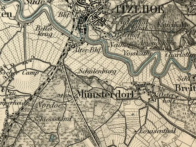 The image shows an old map of the city of Munich, Germany, with text written on it. The map is...