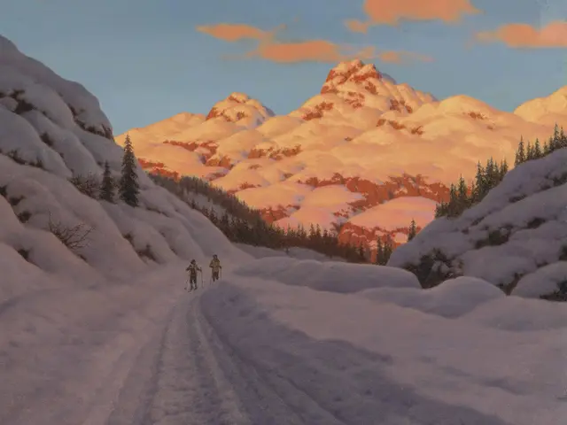 The image shows two people cross country skiing down a snowy mountain road, surrounded by trees and...