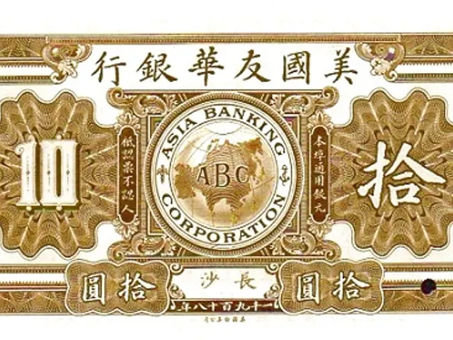 The image shows an old Japanese banknote with Chinese writing on it. The text reads "Asia Banking...