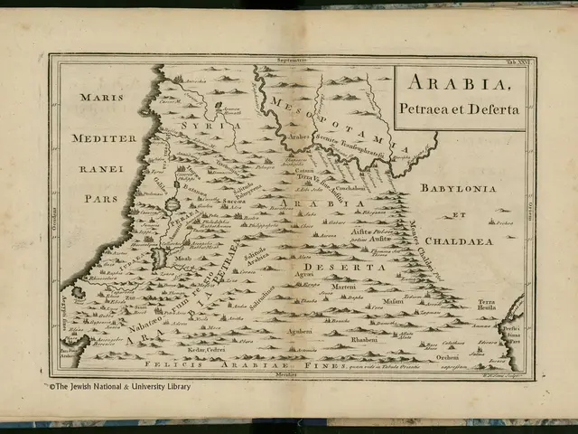 The image shows an open book with a map of Arabia on it, set against a dark background. The map is...
