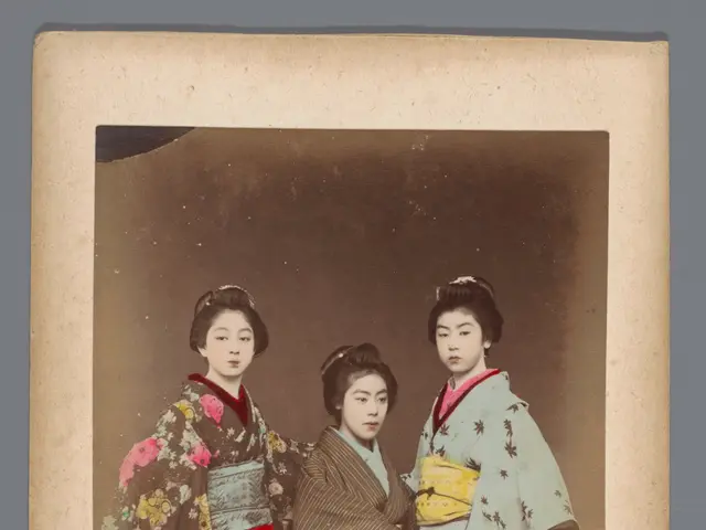 The image shows three geishas in kimono posing for a photo. They are standing in a line, with one...