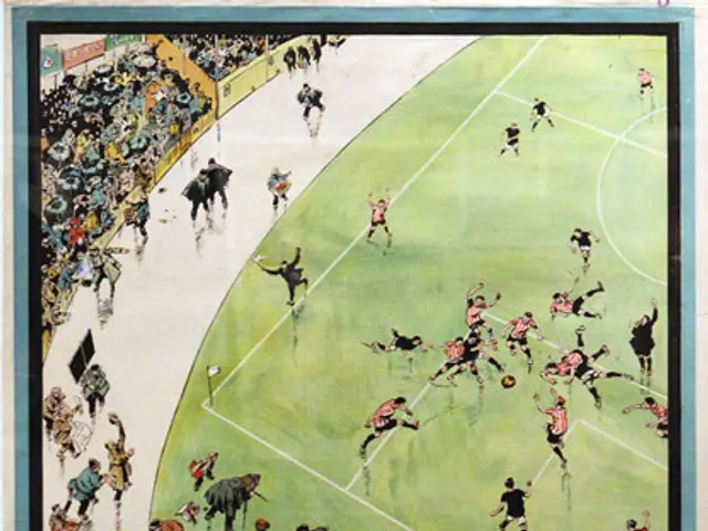The image shows a poster on the wall depicting a group of people playing football in a stadium,...
