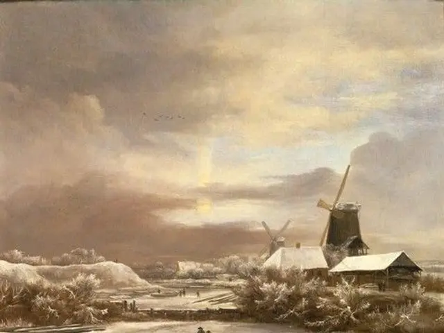 The image shows a winter landscape with a windmill in the background, surrounded by houses, trees,...
