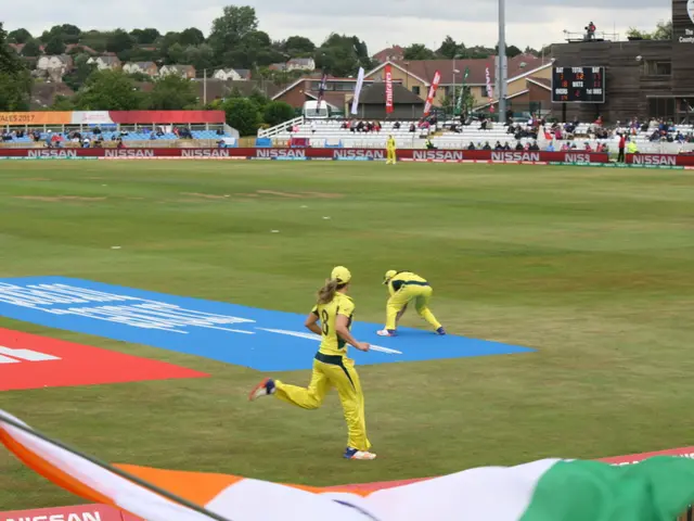 The image shows a cricket match between England and Australia in the ICC Women's T20 World Cup...