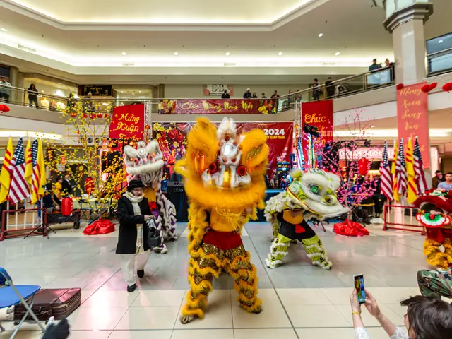 The image shows a vibrant Chinese New Year celebration in a shopping mall. We can see people...