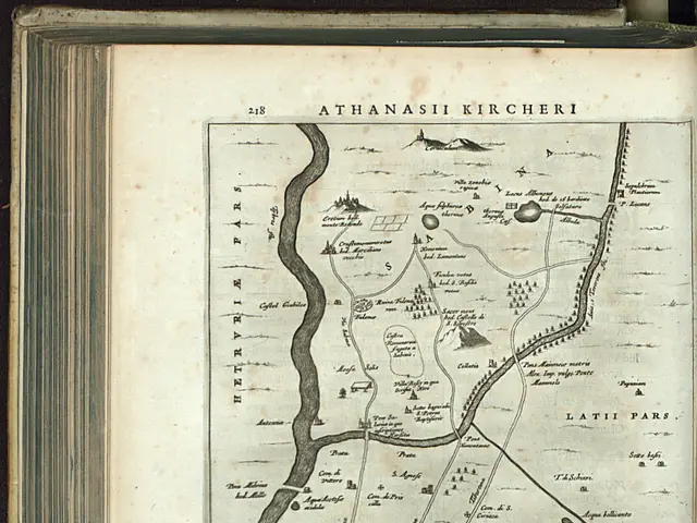 The image shows an open book with a map of the city of Athens on it. The map is detailed and shows...