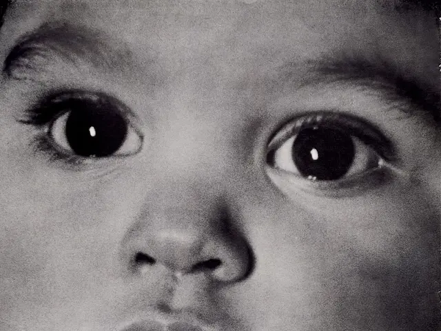 The image shows a poster with a child's face in the center, surrounded by text that reads "Every...