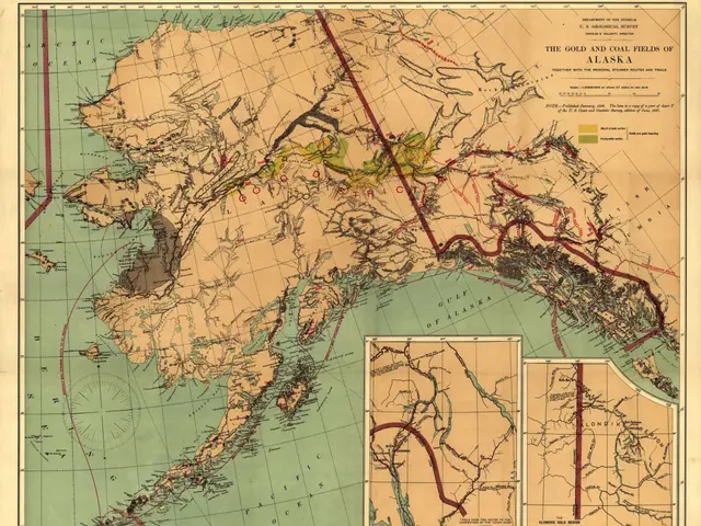 The image shows an old map of Alaska with the gold and coal fields of the area clearly marked. The...