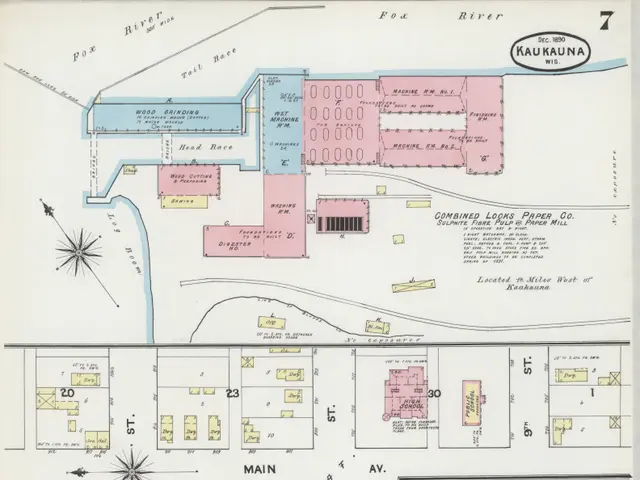 The image shows an old map of the city of Kansas City, Kansas, with a detailed layout of the...