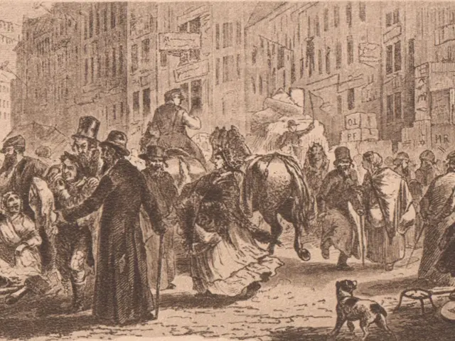 The image shows a crowd of people walking down a street in a city, with buildings in the...