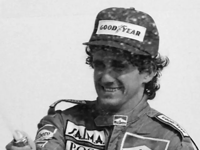 The image shows Ayrton Senna, the legendary Formula One driver, standing and smiling while holding...