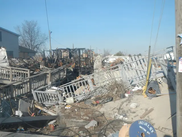 The image shows the aftermath of Hurricane Sandy in Seaside Heights, New Jersey. We can see the...