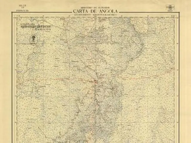 The image shows an old map of the city of Angola, with text at the top and bottom of the paper. The...
