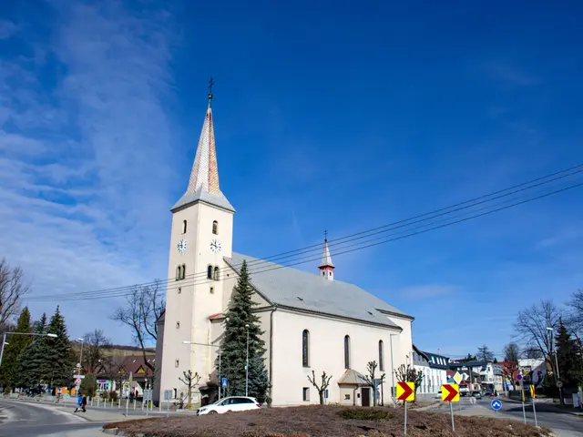 The image shows a church with a steeple in the middle of a small town, surrounded by buildings,...