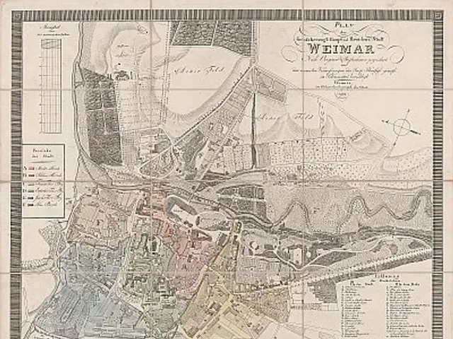 The image shows an old map of the city of Weimar, Germany, with text written on it. The map is...