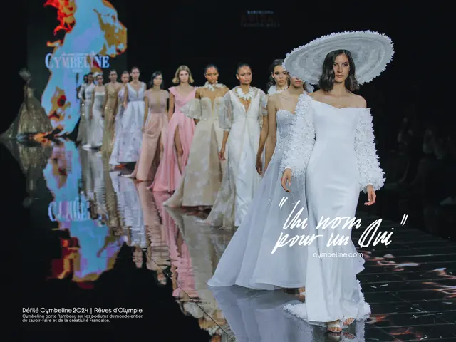 The image shows a group of women walking down a runway in white dresses and hats, with a dark...