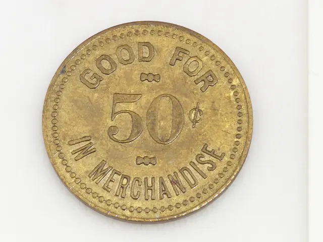 The image shows a gold coin with the words "Good for 50 in Merchandise" written on it against a...