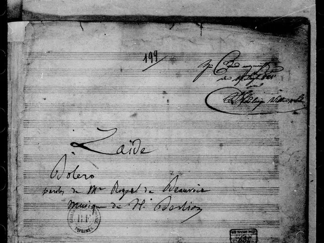 The image shows a black and white photo of a sheet of music with text written on it. The text...