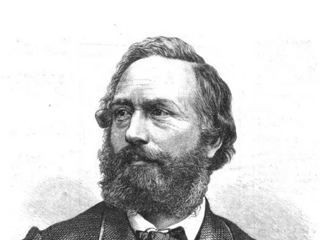 The image shows a black and white drawing of a man with a beard wearing a suit and bow tie. At the...