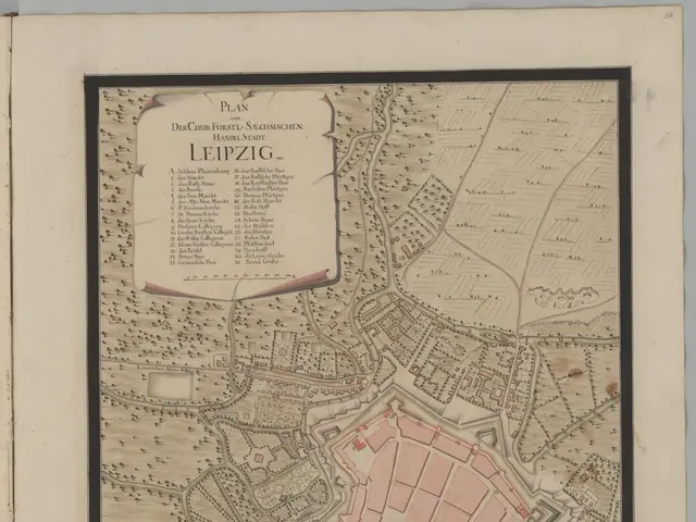 The image shows an old book with a map of the city of Leipzig, Germany, with text on the paper. The...