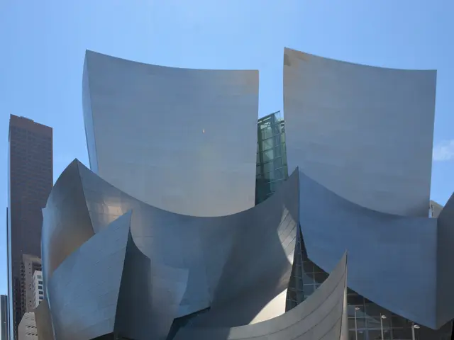 The image shows the ARTIST Concert Hall in Los Angeles, California. It is a modern building with...