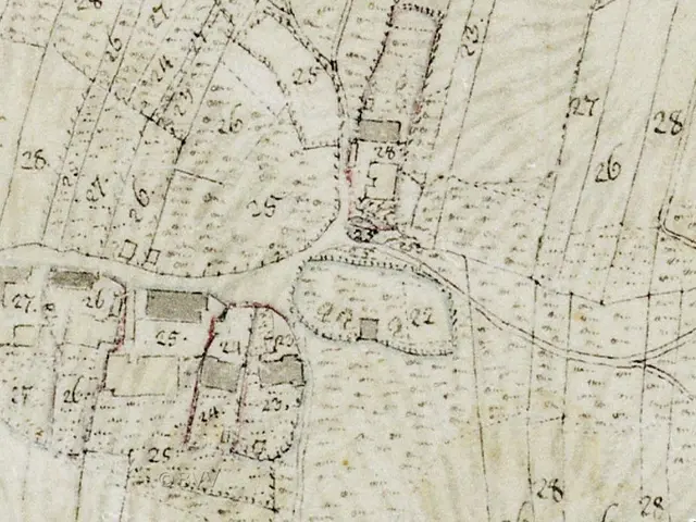 The image shows an old map of a city with a lot of buildings, numbers, and text. It is believed to...