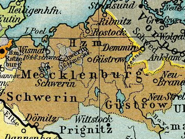 The image shows an old map of Germany with the city of Mecklenburg highlighted. The map is filled...