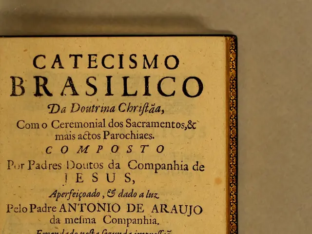 The image shows an old book with the title "Catecismo Brasilico" written on the cover. The book is...
